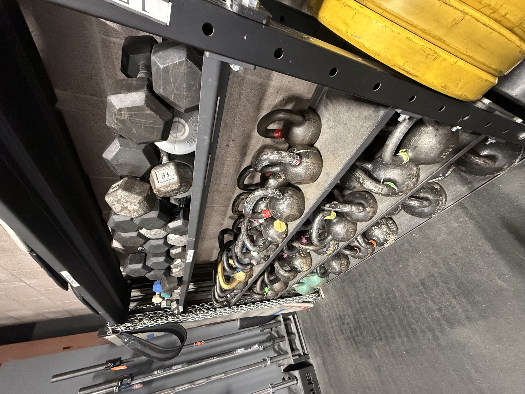 Kettlebells and dumbbells racked
